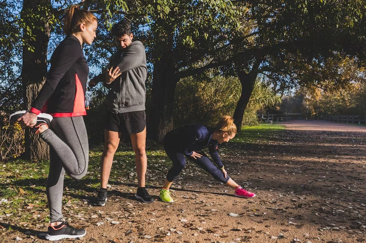 athletes-stretching-and-warming-up-outdoors-before-run
